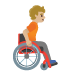 person in manual wheelchair facing right, medium-light skin tone